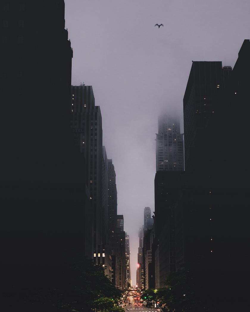 Tips for documenting your Vacation. Isolate by looking up: New York buildings in the fog