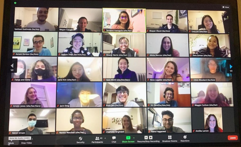 40 students gather on a Zoom call, smiling as they pose for a picture of their meeting.