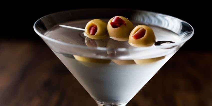 A dry martini with olives.