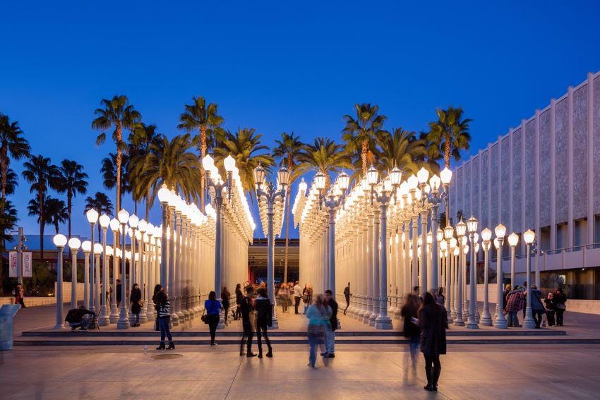 Cover for the Best Art Museums in Los Angeles, California featuring LACMA’s “Urban Lights” outdoor exhibit.