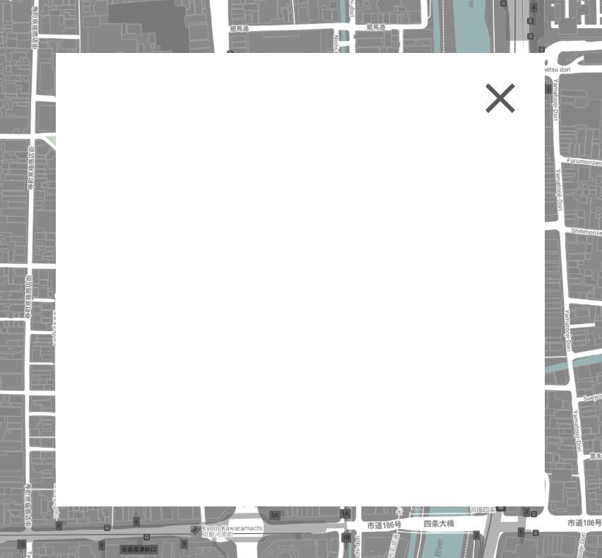 Solid white rectangle shown over a street map