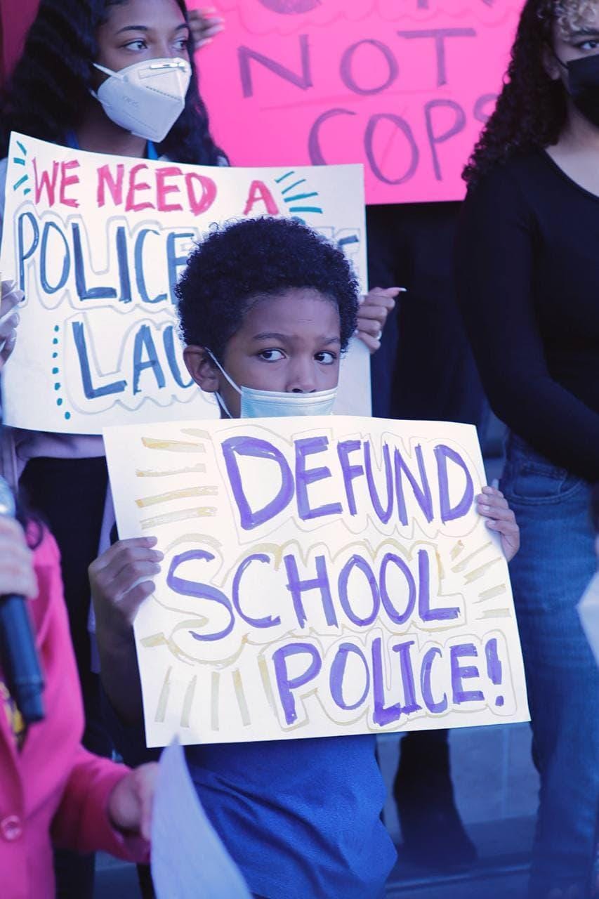 A youth protestor at a rally in June of 2021 to defund school police in front of LAUSD