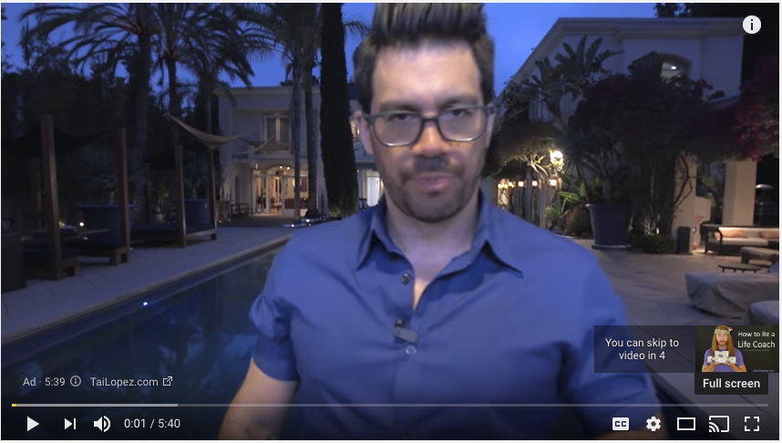 Tai Lopez in front of a mansion
