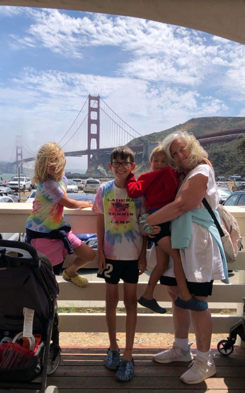 Author and her three grandchildren standing in front of the Golden Gate Bridge in Sausalito, California.