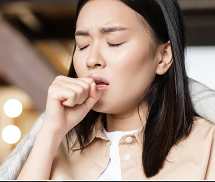 women coughing for sore throat