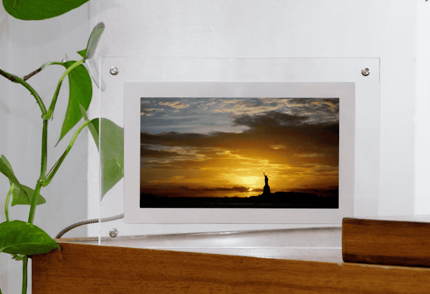 A video of the Statue of Liberty at sunset displayed in an Infinite Object.