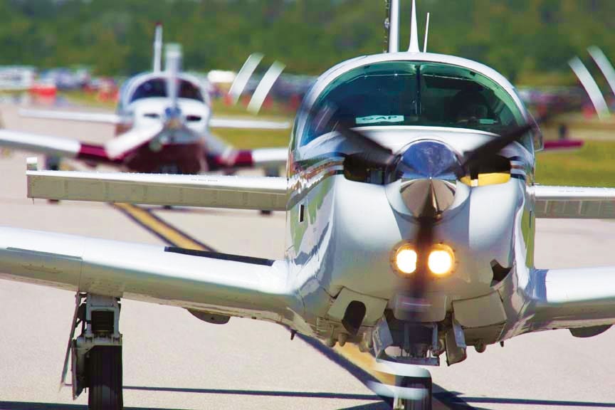 Photo of two aircraft taxiing.