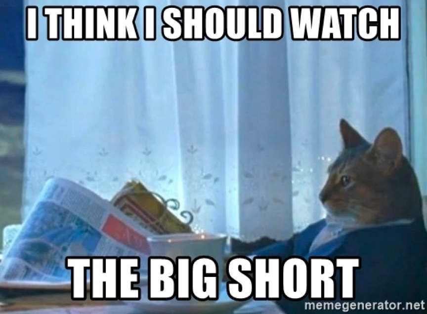 Cat in a suit reading a newspaper, meme typeface overlayed saying “I think I should watch the big short”