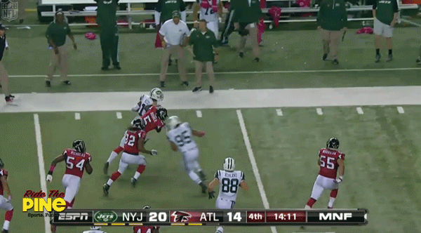 Falcons punter Matt Bosher runs over Jets staffer