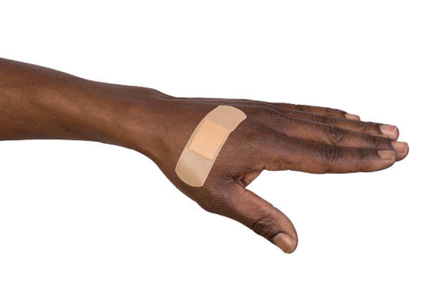 Non-inclusive bandaids — light color band-aid on dark skin