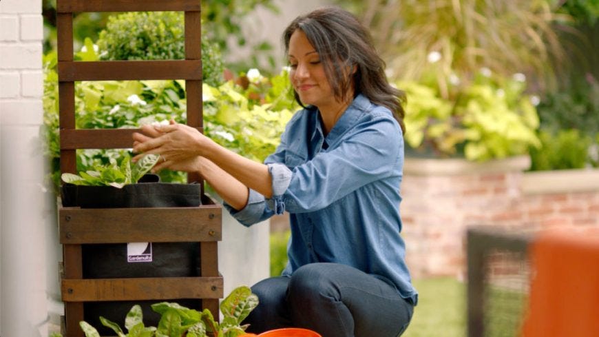 Woman Tending to her Fall Garden