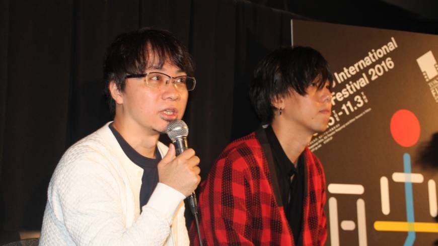 Photo taken of director Makoto Shinkai and musician Yojiro Noda.