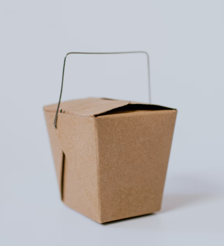 A paper food takeaway box.
