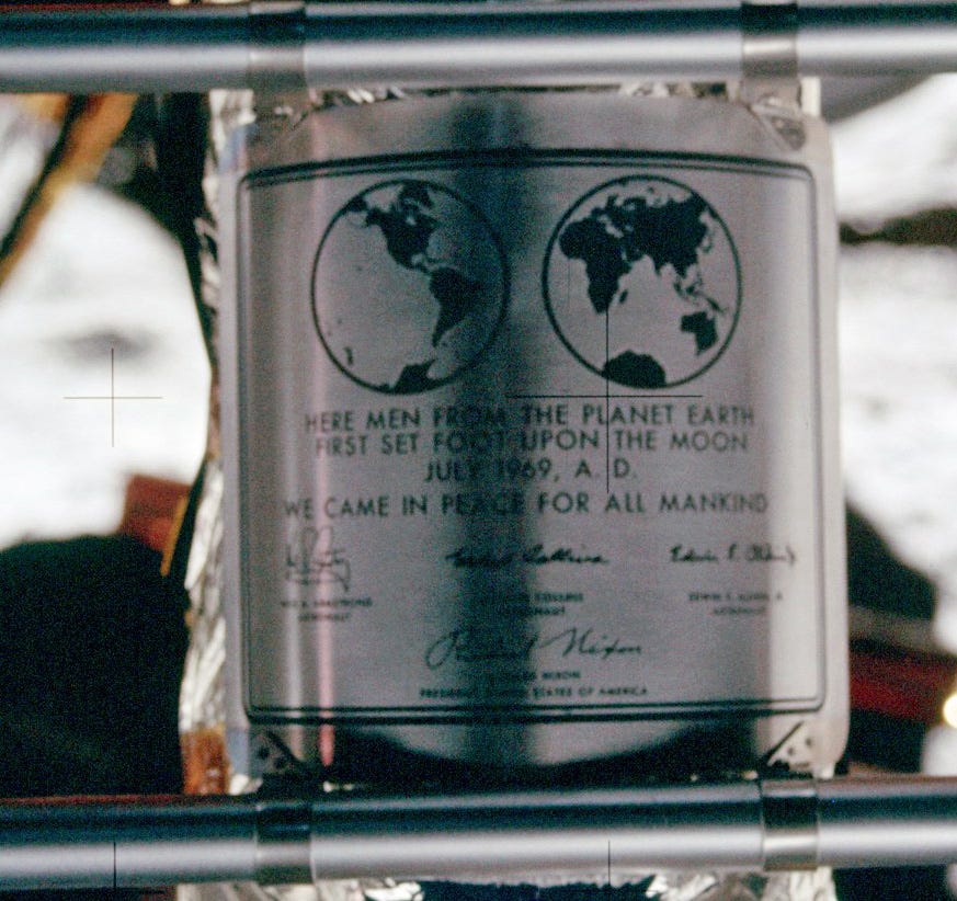 The plaque left on the ladder of Eagle