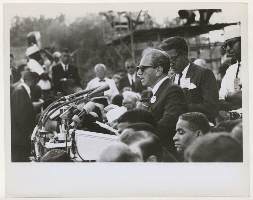 Joachim Prinz speaking at the March on Washington with Bayard Rustin pictured, 1963. American Jewish Congress records, undated, 1916–2006. Image courtesy of AJHS.