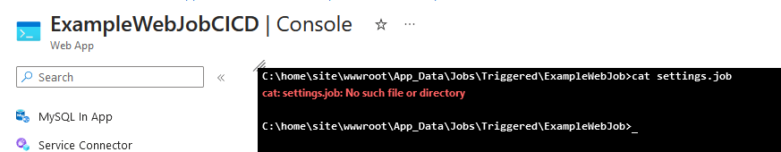 A screenshot of the console for the App Service, with an attempt to run the command `cat settings.job` in the directory c:\home\site\wwwroot\app_data\jobs\triggered\ExampleWebJob, with the error response ‘cat: settings.job: No such file or directory`