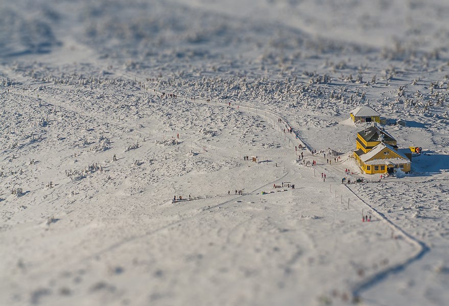 Photo from mountains with tilt-shift effect to imitate miniature building