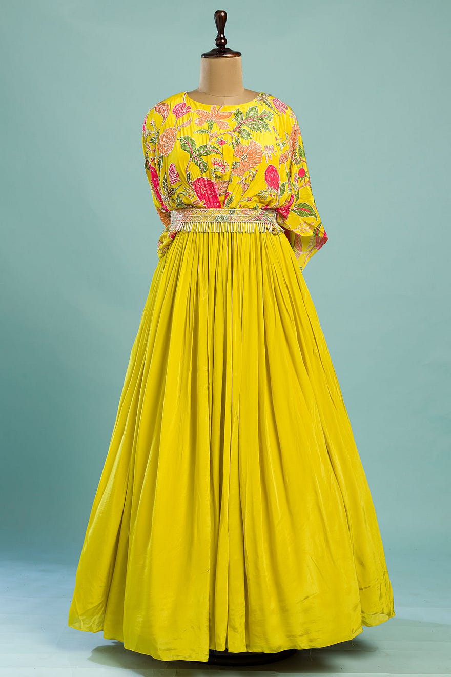 Yellow Crepe Party Wear Salwar Kameez With Printed And Round Neck Online at Samyakk