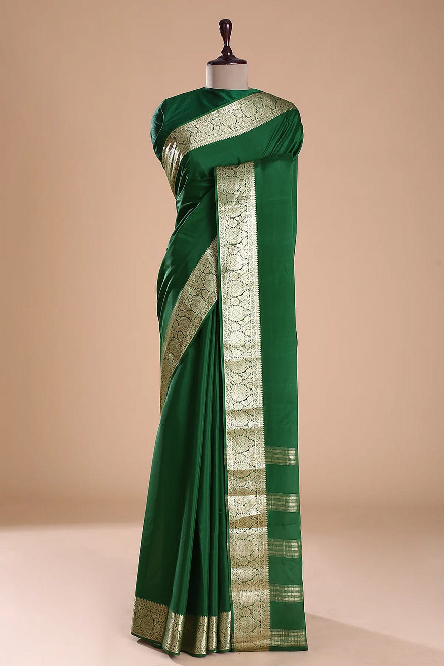 Dark Green Crepe Silk Saree with Zari Woven and Unstitched Blouse Online at Samyakk