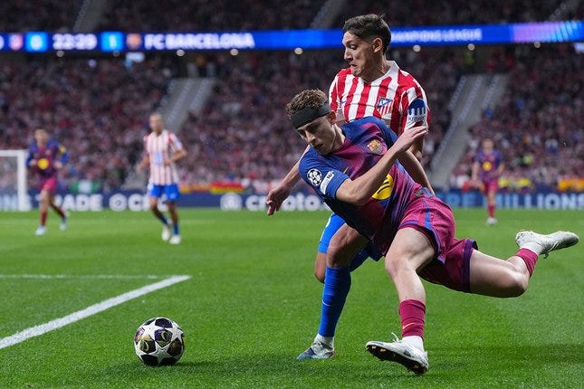 ITUGOL — Fermin Lopez dan Nahuel Molina berebut bola dalam laga leg kedua perempat final Liga Champions antara Atletico Madrid vs Barcelona di Metropolitano, 15 April 2026 © AP Photo/Manu Fernandez