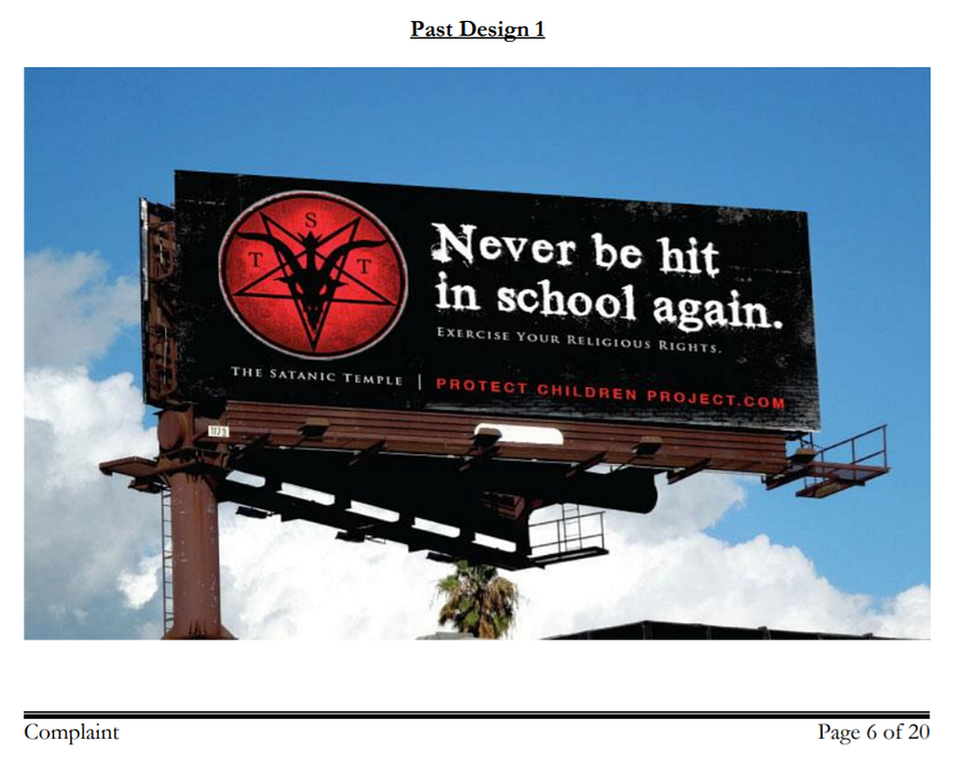 TST billboard that says “Never be hit in school again”