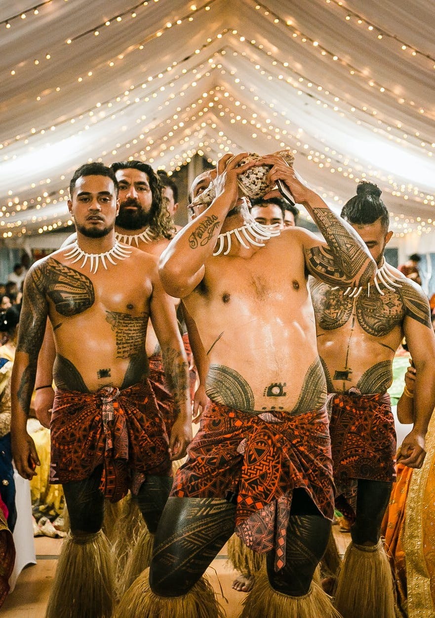 Samoan male dancers dancing