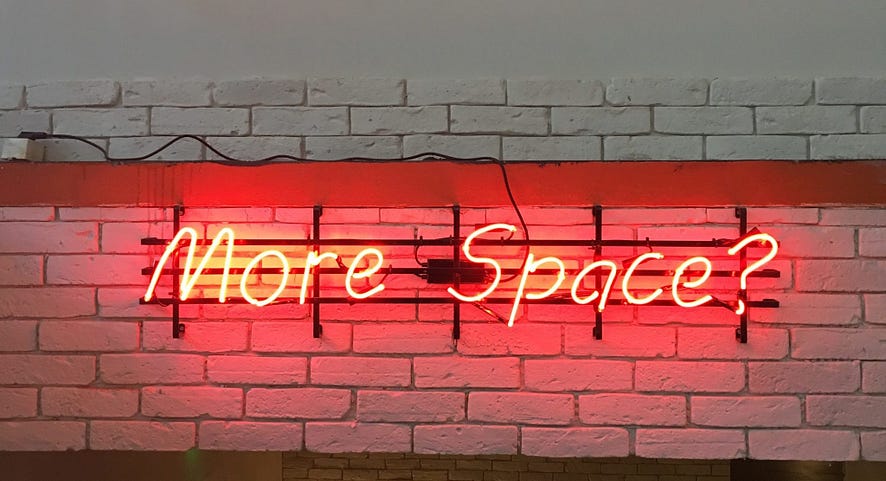 neon sign - more space - Photo by Sami Mititelu