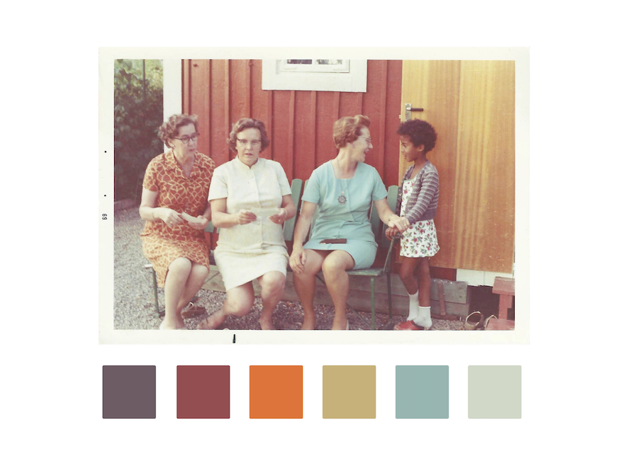 Maya’s aunts and older sister sit outside a wooden hut in Sweden.