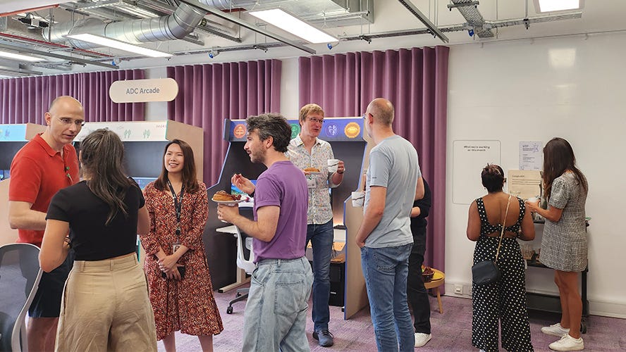 Our group standing in the room, enjoying breakfast before the workshop started.