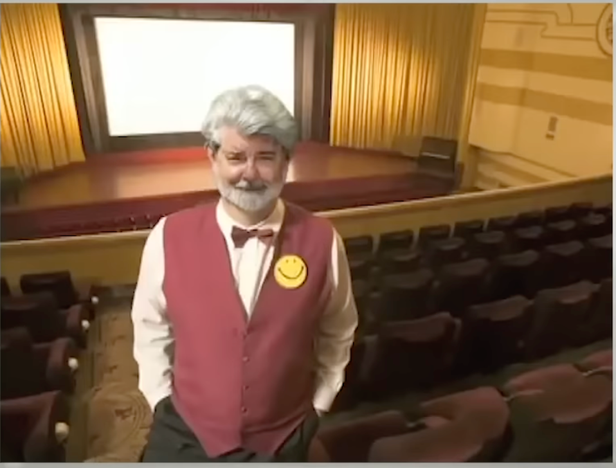 George Lucas ushering patrons to their seats.