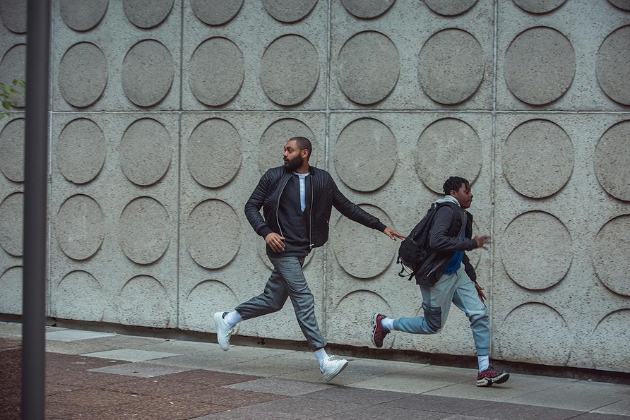 A man and a boy flee the scene