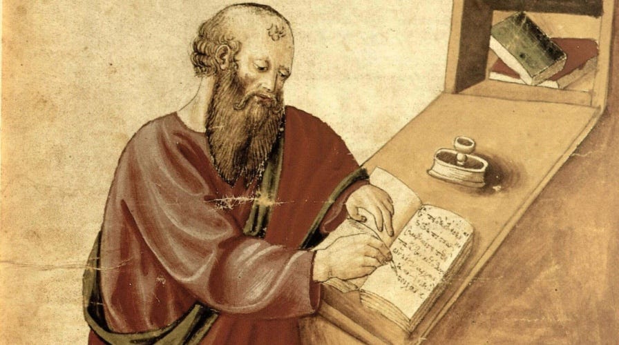 A medieval illustration of Aristotle at his writing desk