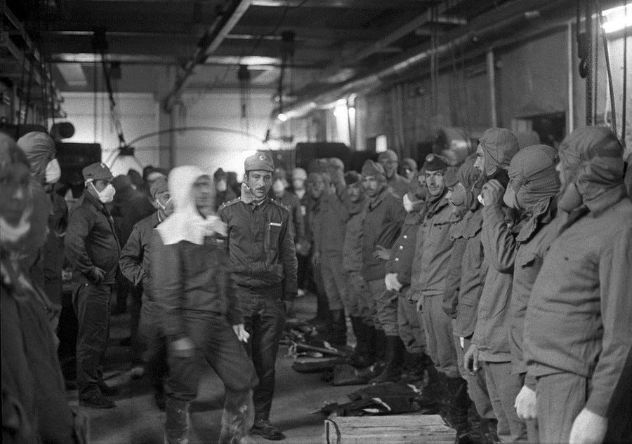 men line up in uniform