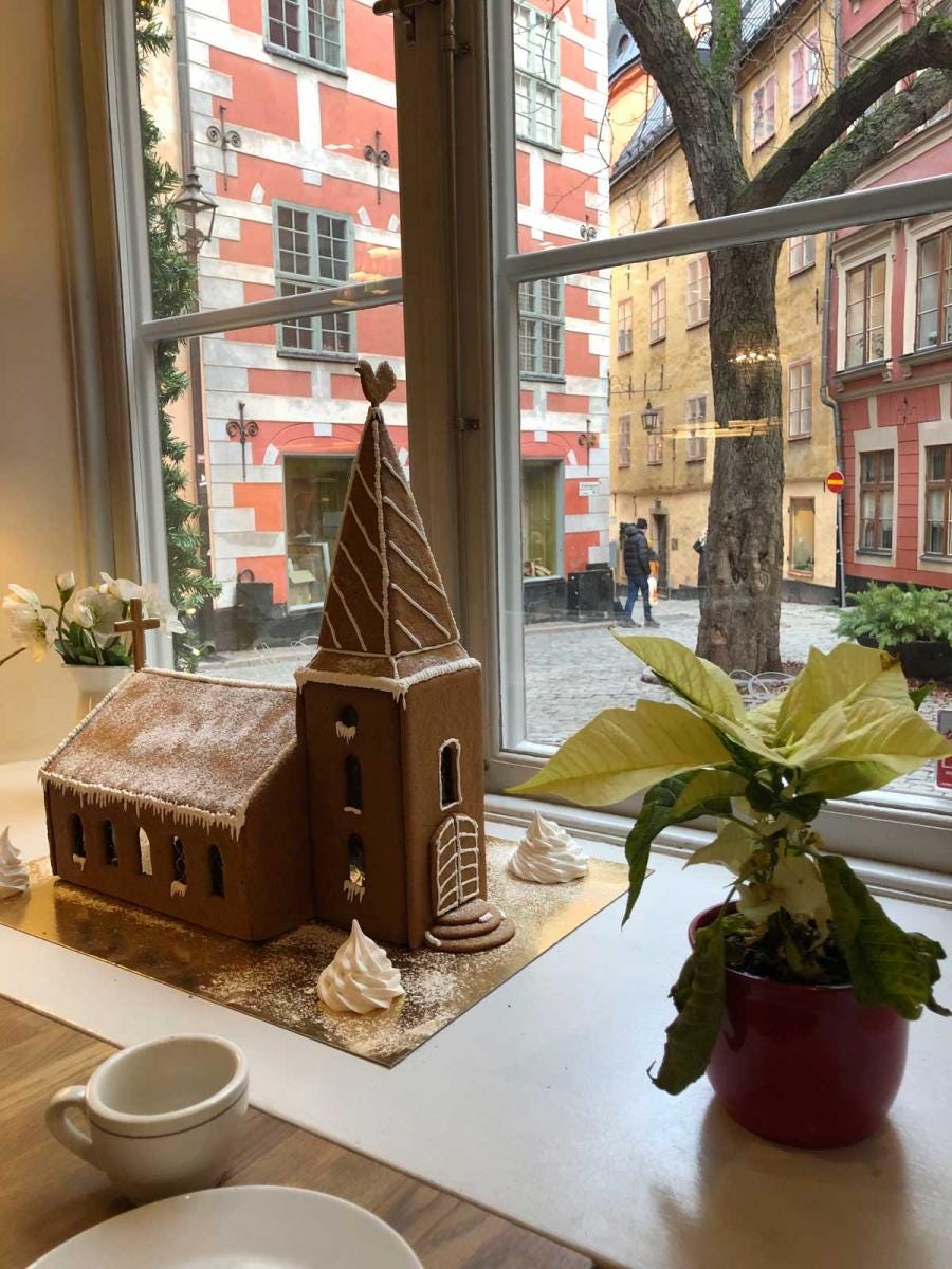 Gingerbread church on a table overlooking Old Stockholm.