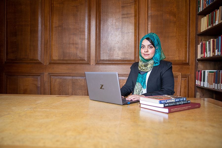 Rihab Khalid looking working on laptop