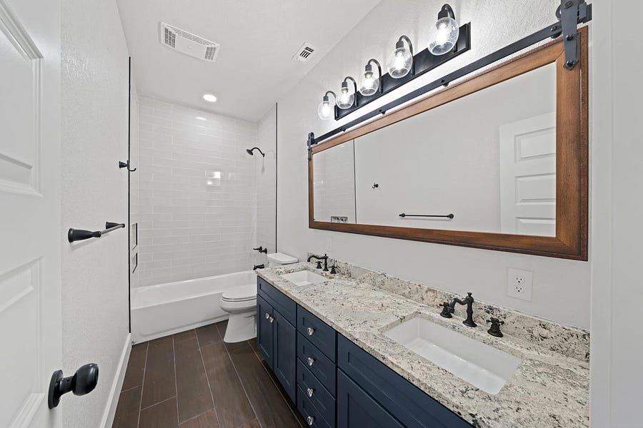 Texas barndominium by Kristina Richie - Guest bathroom