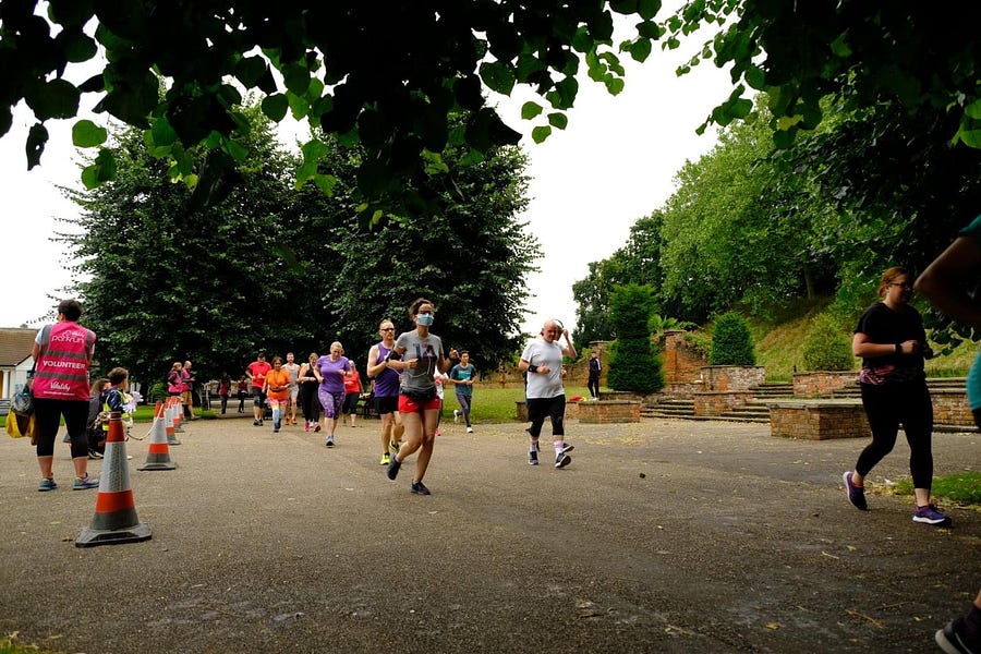 People leaving the starting line at Colchester Castle parkrun