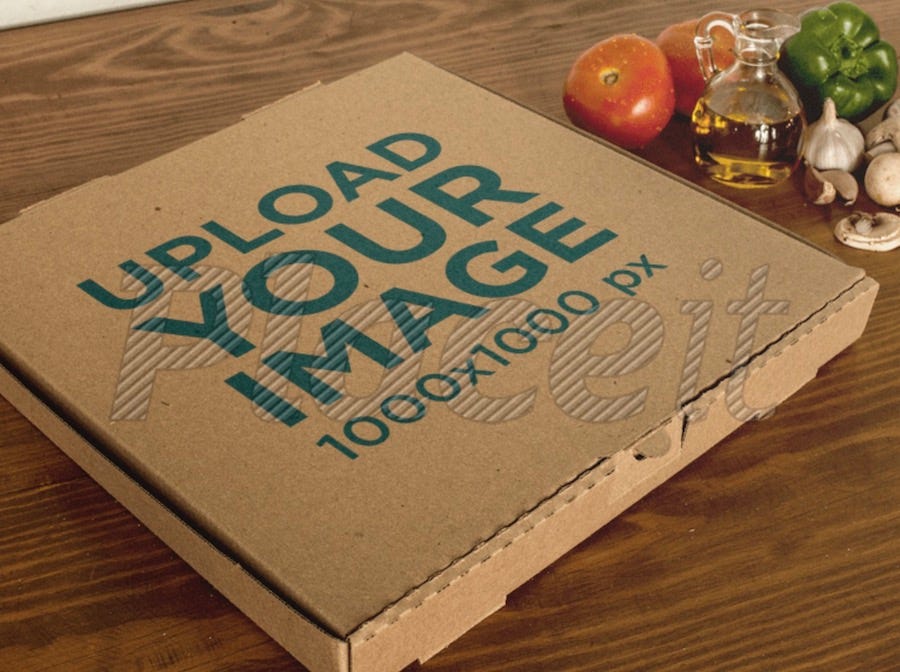 pizza box mockup with vegetables on a wooden surface