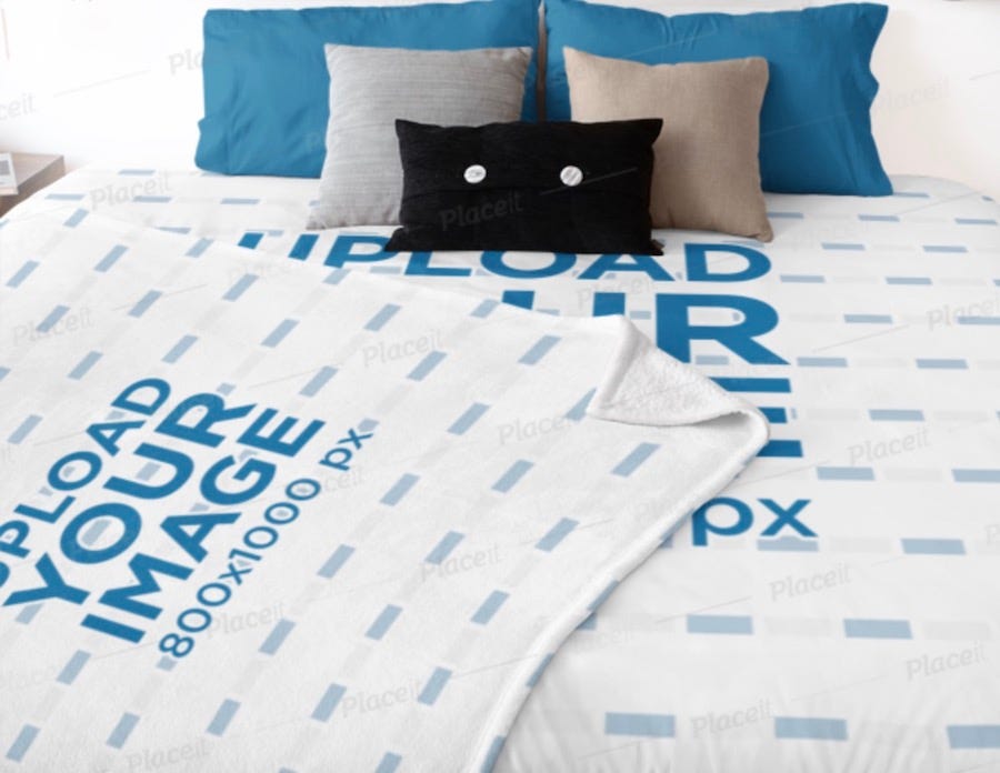 mockup featuring a duvet cover and a blanket on a bed