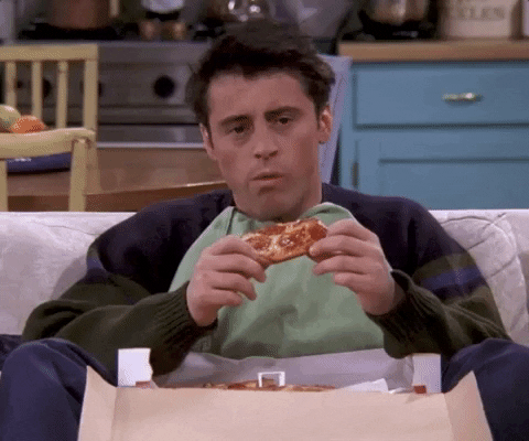 Gif of Joey from Friends eating pizza while saying "I don't know"