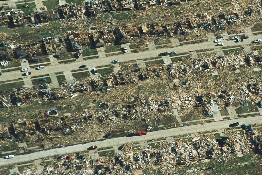 Destroyed cookie-cutter housing development following major tornado.
