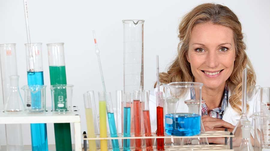 Woman in lab / cleanroom environment