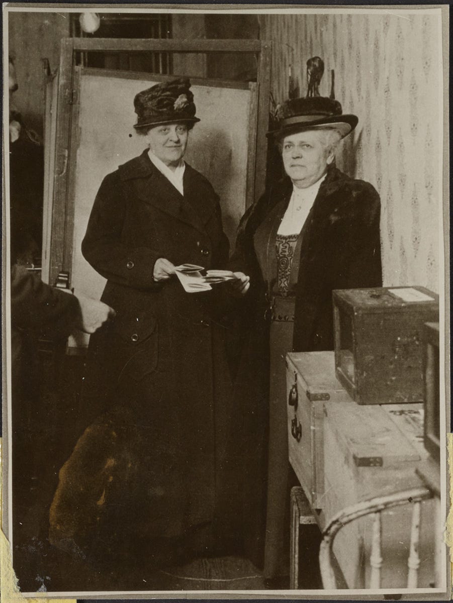 Suffragists Carrie Chapman Catt and Mary Garrett Hay cast their first presidential ballots together, November 2, 1920.