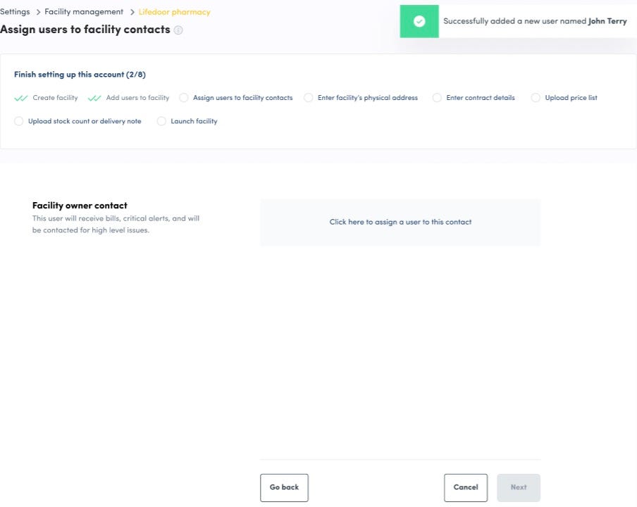 A SaaS onboarding page with a checklist at the top. The body is empty space with a CTA that says “click here to assign a user to this contact”