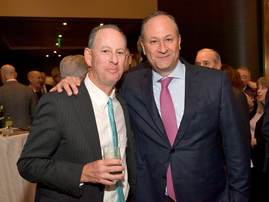 Doug Emhoff (right) with a guest at The Hollywood Reporter Power Lawyers Breakfast in 2019.