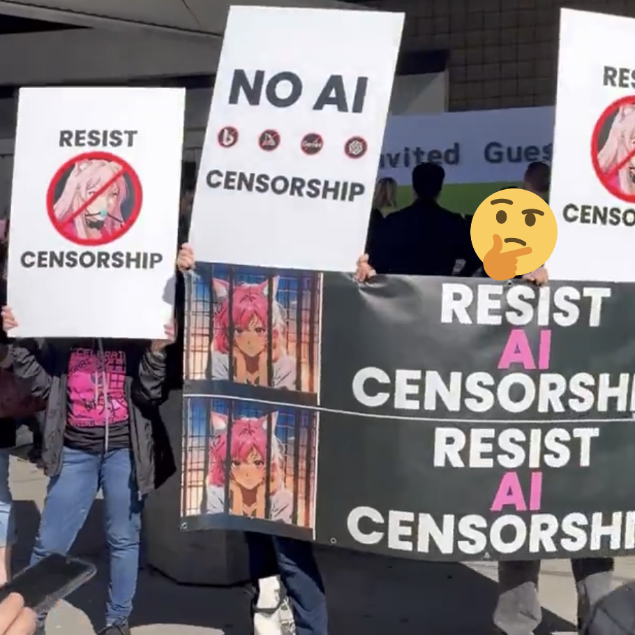 Photo of the “no AI censorship” protest at GTC. The “accelerate catgirl research” slogan being chanted can be seen on the protestors’ matching t-shirts. A thinking face emoji is used to protect the privacy of a protestor.