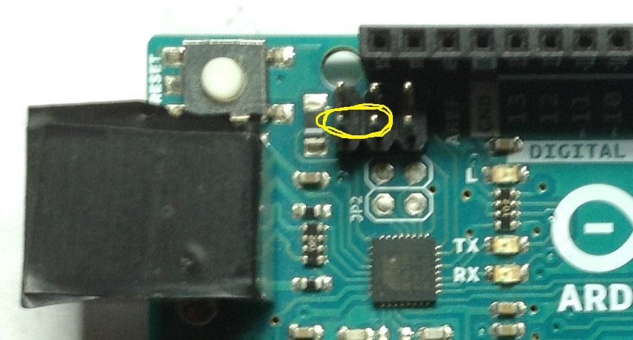 Circled in yellow, two left pins in the bottom row of three relative to the top when usb input is at left.