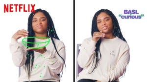 A Netflix screenshot still of Nakia Smith on Black American Sign Language.