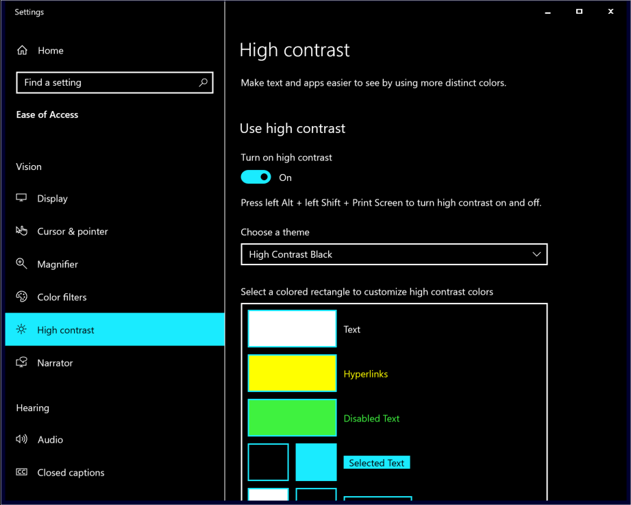 Screenshot of high contrast settings in Windows 10, showing the default colors selected for theme, with a black background and bright colors to indicate links, text, and other elements.