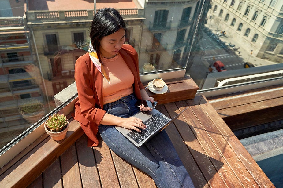 A person working remotely in a relaxed manner.